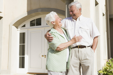 Elderly Couple Talking About Medicare Supplement Insurance Plan